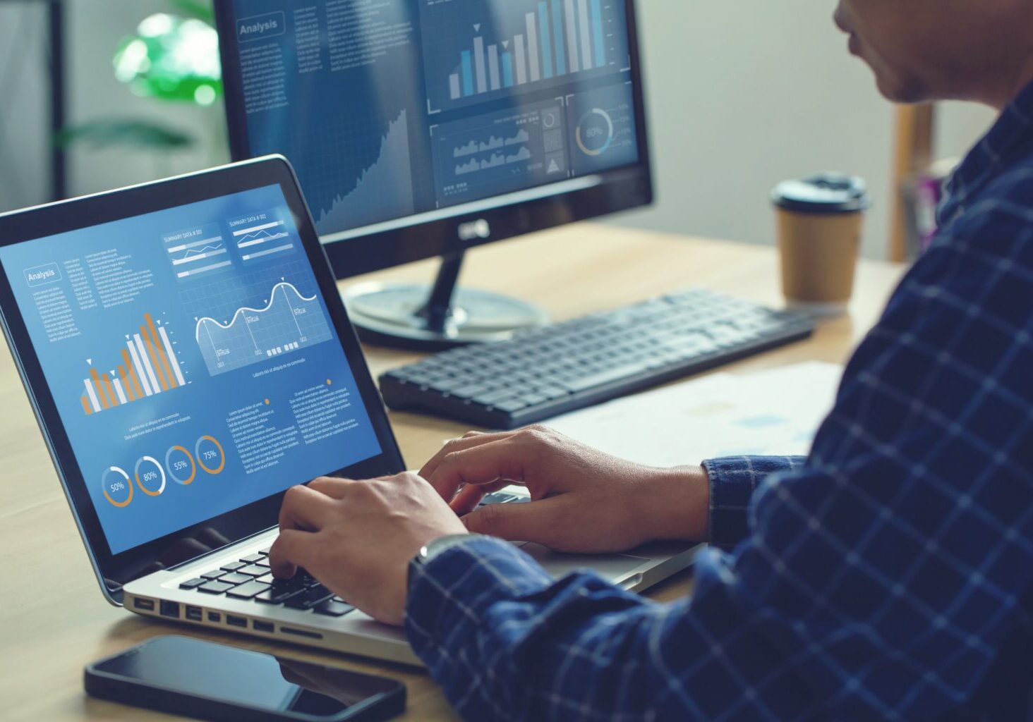 Analyst,Works,On,Personal,Computer,Showing,Business,Analytics,Dashboard,With